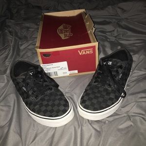 Black/ grey checkerboard vans